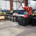 Long-material handling and saw-table arrangements from 2015. View 2 of 2