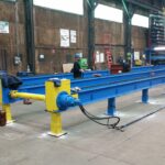 Wide view of the blue-and-yellow long-product line