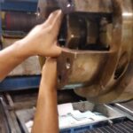 Shaft, flange, and machine-component views from a 2016 service event. View 1 of 3
