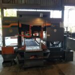Compact saw and material-support arrangement