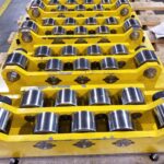 Yellow roll cassette and polished roll-surface details. View 1 of 6