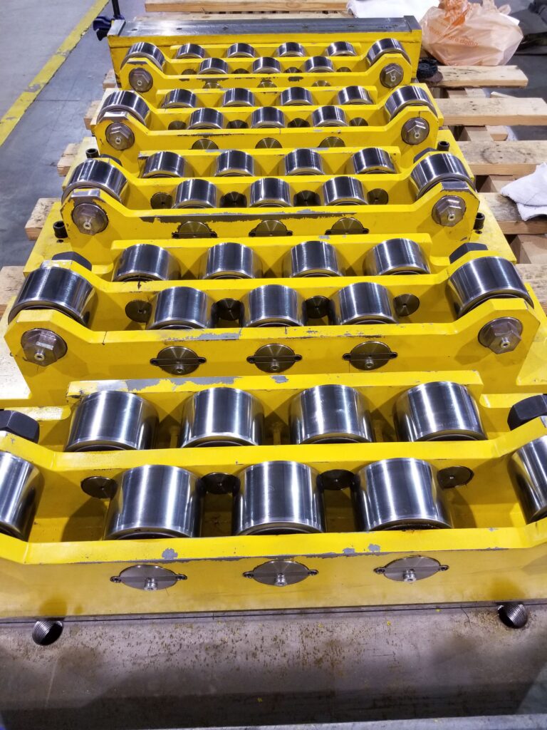 Yellow roll cassette and polished roll-surface details. View 1 of 6