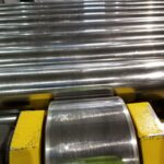 Yellow roll cassette and polished roll-surface details. View 4 of 6