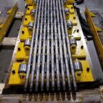 Straightener and leveler equipment and roll assemblies from multiple sides. View 3 of 6