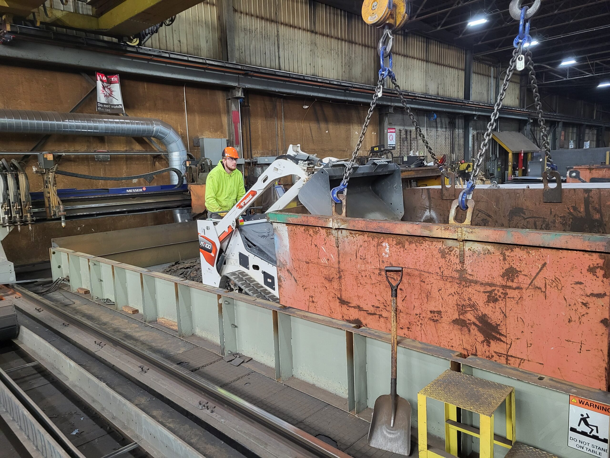 Cutting table cleanout and preventive maintenance work.