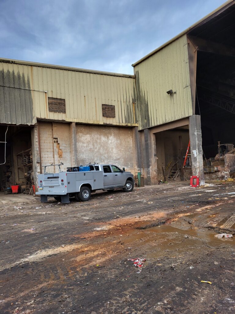 NMS service vehicle at an industrial exterior