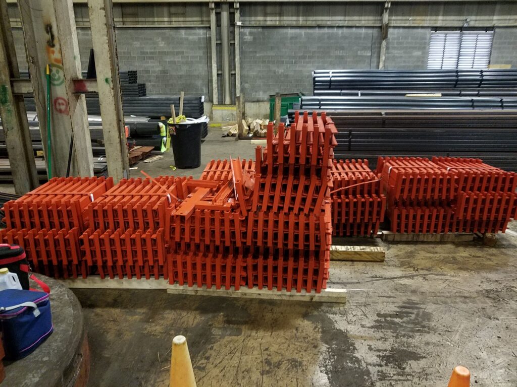 Industrial rack components staged inside a facility
