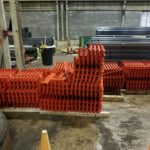 Industrial rack components staged inside a facility