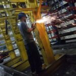 Industrial rack repair work at an existing upright