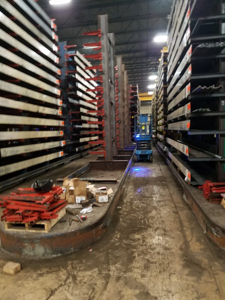 Industrial rack aisle during a replacement project