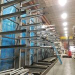 Wide view through an industrial material storage aisle