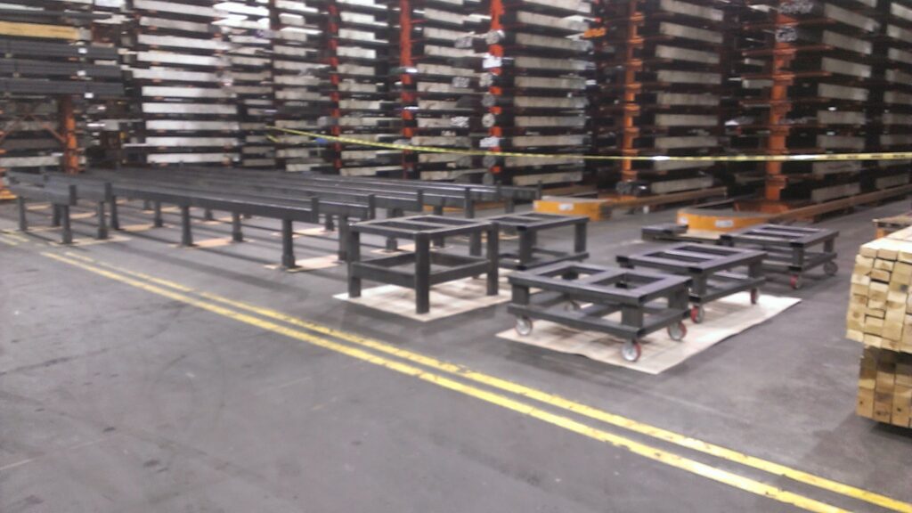 Fabricated industrial table assemblies before painting