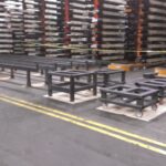 Fabricated industrial table assemblies before painting
