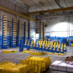Packaged industrial rack sections staged beside a truck