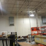 Overhead work above the new sewing workstation area